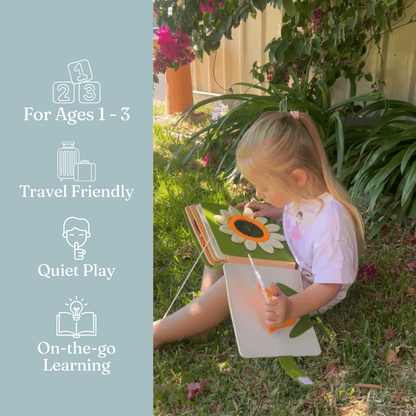 Toddler playing with Teddy Tales personalised felt busy book by Cubby